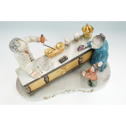 50 - Capodimonte porcelain Italian figurine of 'Il Farmacist', hand signed, together with a large chemist... 