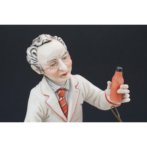 50 - Capodimonte porcelain Italian figurine of 'Il Farmacist', hand signed, together with a large chemist... 