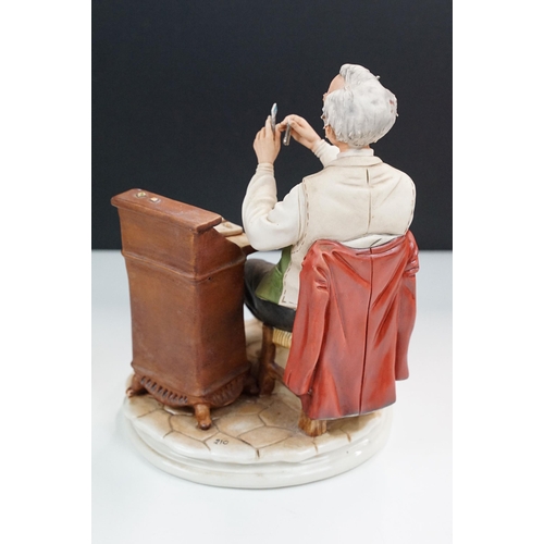 50 - Capodimonte porcelain Italian figurine of 'Il Farmacist', hand signed, together with a large chemist... 