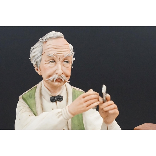 50 - Capodimonte porcelain Italian figurine of 'Il Farmacist', hand signed, together with a large chemist... 