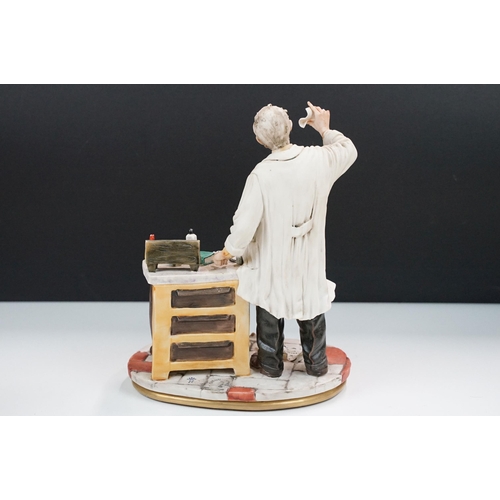 50 - Capodimonte porcelain Italian figurine of 'Il Farmacist', hand signed, together with a large chemist... 