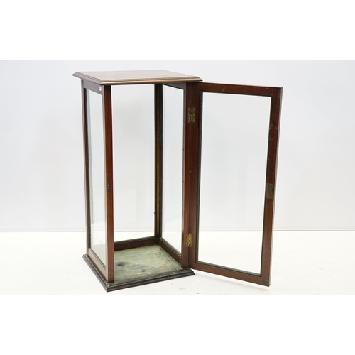 143 - Early 20th century mahogany display cabinet, the single glazed door with carved surround, 74cm high ... 