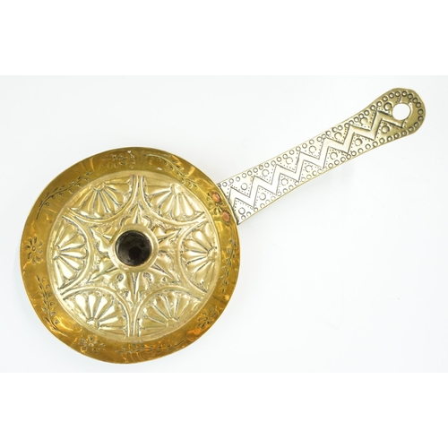 144 - Early 20th century brass chamberstick, with incised and impressed decoration, with copper rivets, 27... 