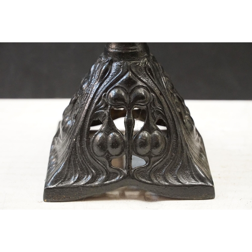 120 - Art Nouveau cast iron oil lamp base, moulded mark 494604, 56cm high in total and two other oil lamps... 