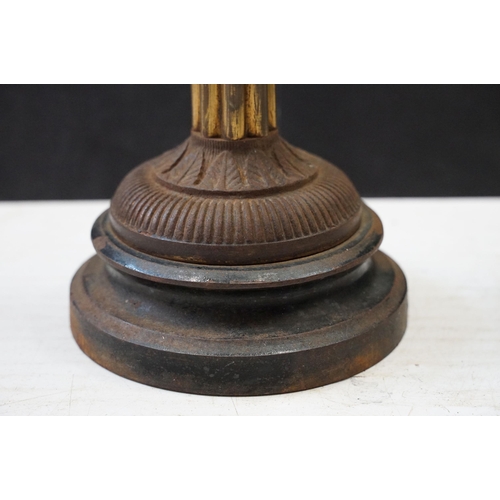 120 - Art Nouveau cast iron oil lamp base, moulded mark 494604, 56cm high in total and two other oil lamps... 