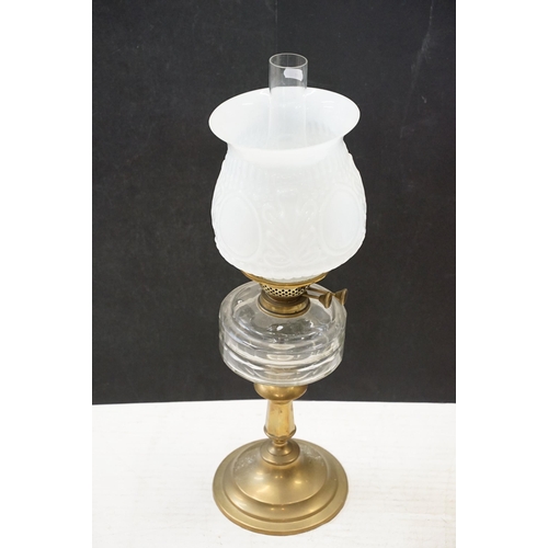 120 - Art Nouveau cast iron oil lamp base, moulded mark 494604, 56cm high in total and two other oil lamps... 