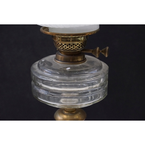 120 - Art Nouveau cast iron oil lamp base, moulded mark 494604, 56cm high in total and two other oil lamps... 