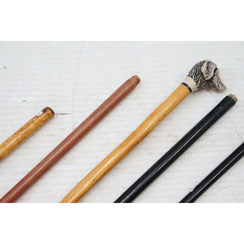 319 - Hallmarked gold tipped walking cane, with monogram to top with tapering black lacquered cane, 90cm l... 