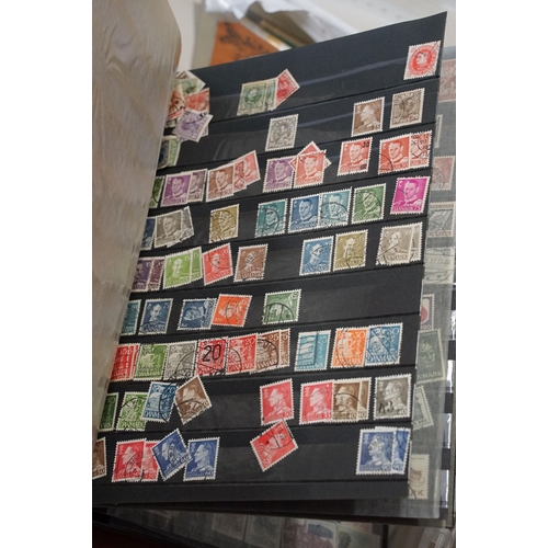 402 - Collection of assorted loose stamps and first day covers as well as three albums of 19th Century and... 