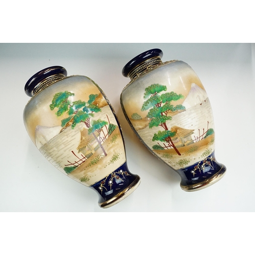 72 - Pair of large hand decorated double panel Japanese vases with landscape and ladies scenes. character... 