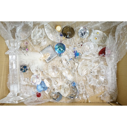 99 - Large collection of Swarovski and crystal pieces to include paperweights, owl, swan, candlestick, sq... 