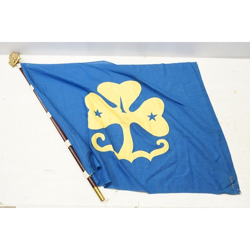 317 - Girl Guide's flag, with brass finial and tip, the blue cotton flag with yellow guiding motif front a... 