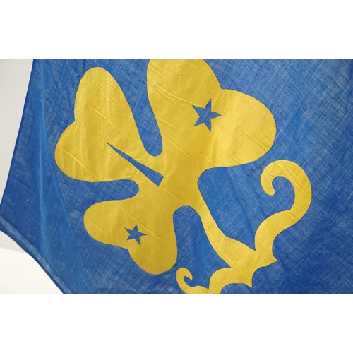 317 - Girl Guide's flag, with brass finial and tip, the blue cotton flag with yellow guiding motif front a... 