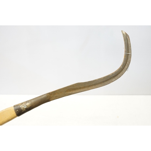 329 - Vintage axe and sickle scythe cutter, wooden handles, no makers marks.