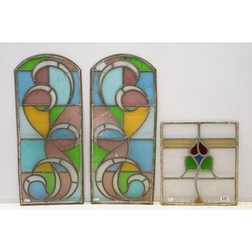 337 - Three stained glass windows, one rectangular H 39.5cm x W 35cm, two arched, H 69.5cm W 29cm