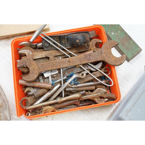 339 - Collection of mostly metal working tools to include spanners, plane etc together with four cast iron... 