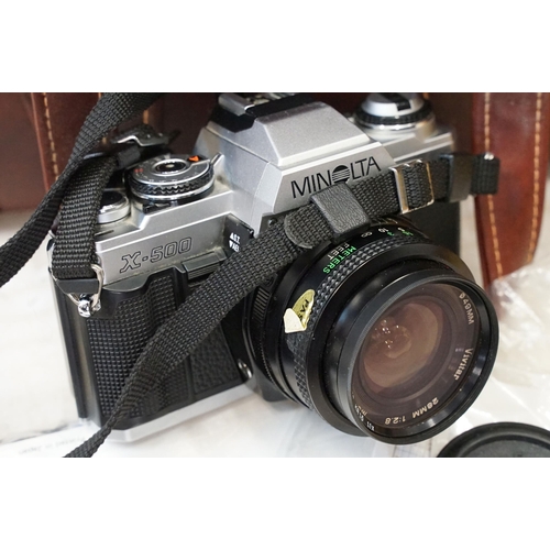 359 - Minolta XG-M and Minolta X500 cameras with three lenses and accessories