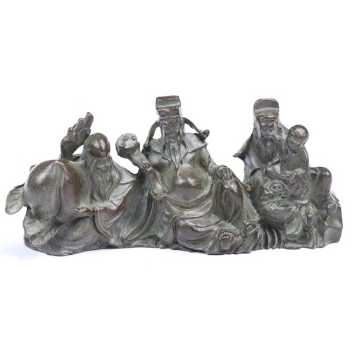 232 - A Chinese ornamental bronze Buddhist Feng Shui figures, approx 11cm in length.