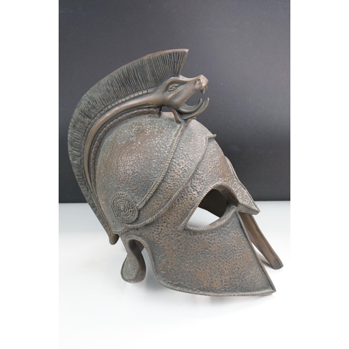 164 - Centurion Gladiator Macedonian battle helmet on stand and wooden stepped base, H66cm