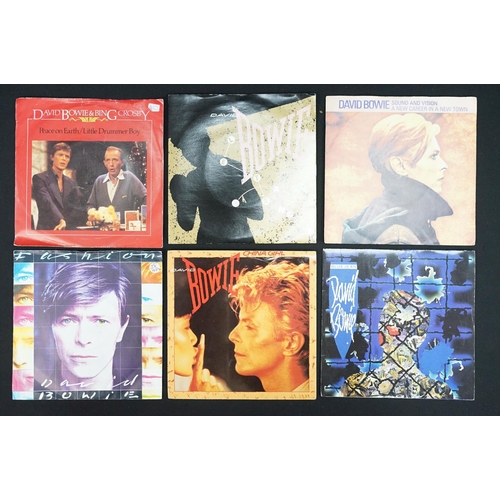 338 - Vinyl - 28 David Bowie 7” singles spanning his career including foreign pressings (German, South Afr... 