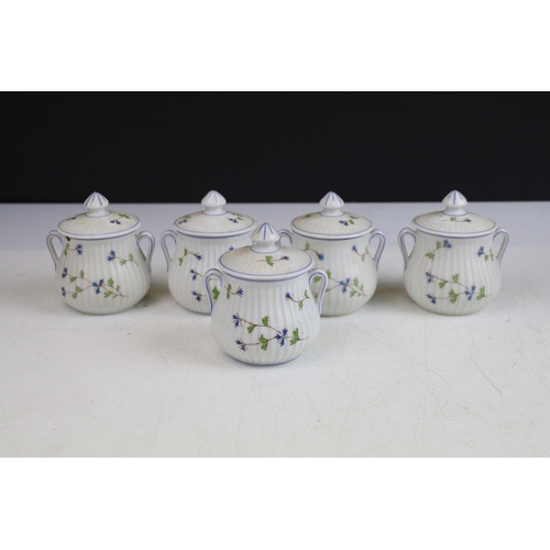 56 - Five early 20th century Albert Pillivuyt, France floral design chocolate pots with twin handles and ... 