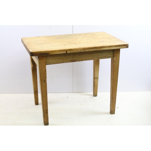 564 - Early 20th century pine kitchen table of small proportions, with one frieze drawer on square taperin... 