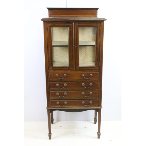 566 - Edwardian mahogany inlaid display cabinet with double glazed doors above an arrangement of four draw... 