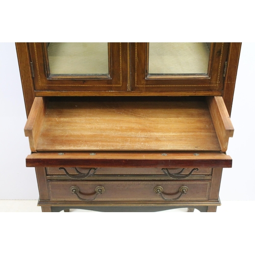 566 - Edwardian mahogany inlaid display cabinet with double glazed doors above an arrangement of four draw... 