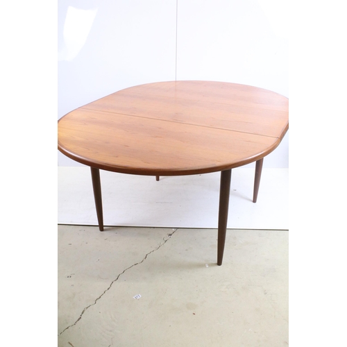 569 - G-Plan Fresco mid century extending dining table designed by Victor Wilkins, 72cm high x 122cm diame... 