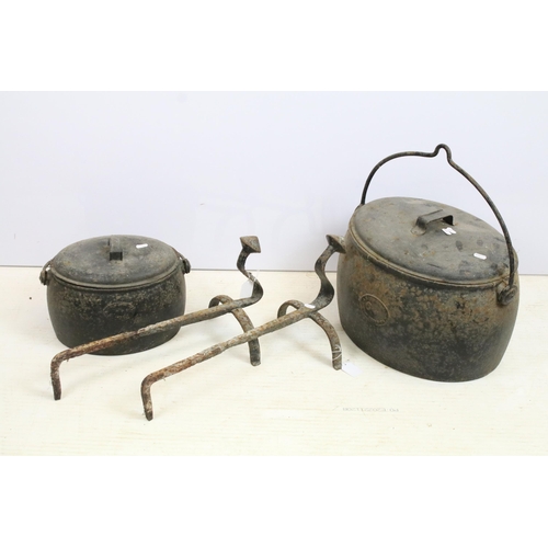 420 - Cast iron pans, A .Kenrick & Sons, West Bromwich 2 gallon and 6 gallon examples with lids and handle... 