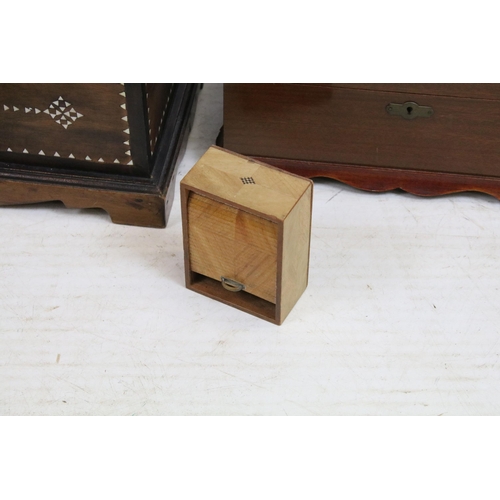 427 - Collection of four boxes, comprising: an early 20th century walnut cantilevered box, opening to thre... 