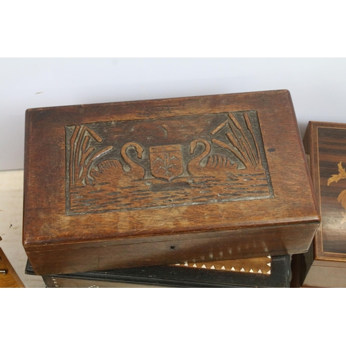 427 - Collection of four boxes, comprising: an early 20th century walnut cantilevered box, opening to thre... 