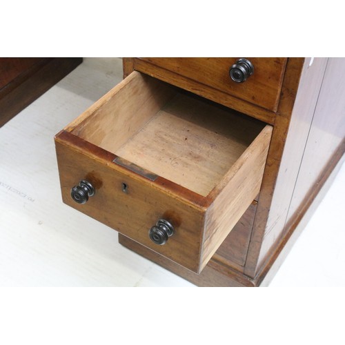 573 - Vixctorian mahogany twin pedestal desk, with an arrangement of nine drawers, some of the brass locks... 