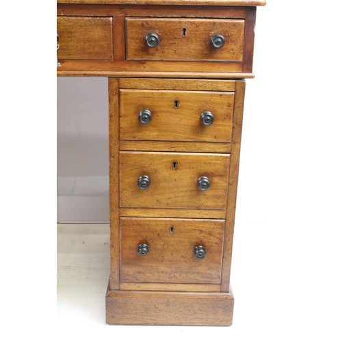 573 - Vixctorian mahogany twin pedestal desk, with an arrangement of nine drawers, some of the brass locks... 