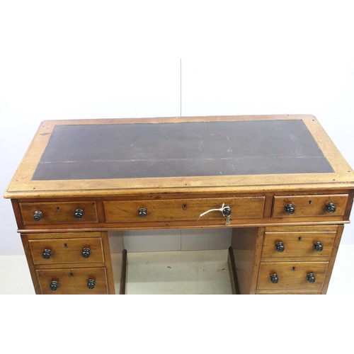 573 - Vixctorian mahogany twin pedestal desk, with an arrangement of nine drawers, some of the brass locks... 