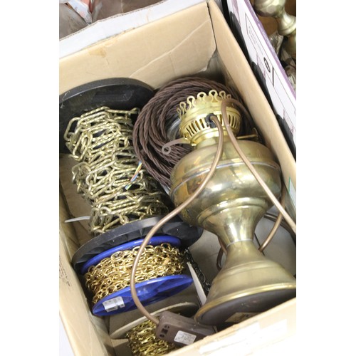 422 - An extensive collection of oil lamp and lighting related fittings and accessories. The lot to includ... 