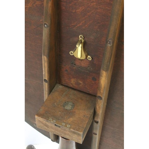 570 - 19th Century oak tilt top table with tripod base, H 68cm diameter 79cm