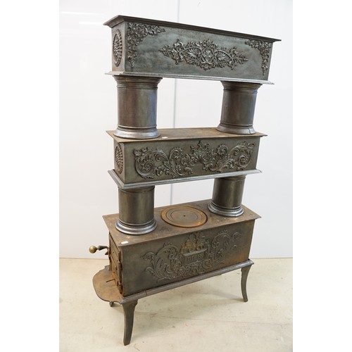 438 - Unusual 19th century Continental cast iron sectional stove of graduated three tiered form, the botto... 