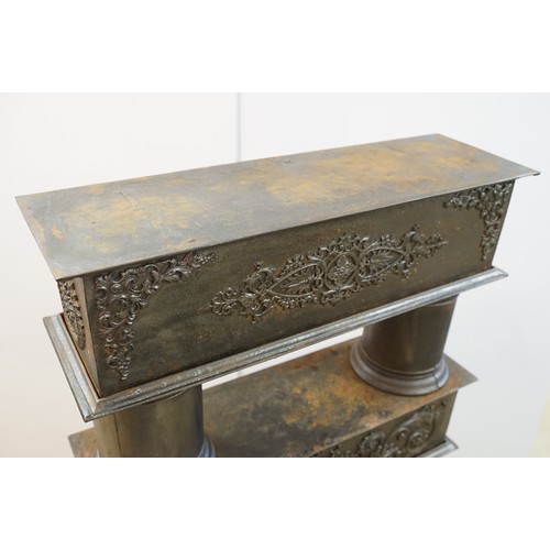 438 - Unusual 19th century Continental cast iron sectional stove of graduated three tiered form, the botto... 