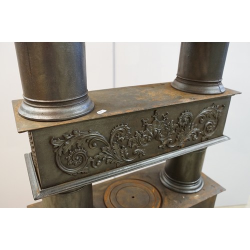 438 - Unusual 19th century Continental cast iron sectional stove of graduated three tiered form, the botto... 