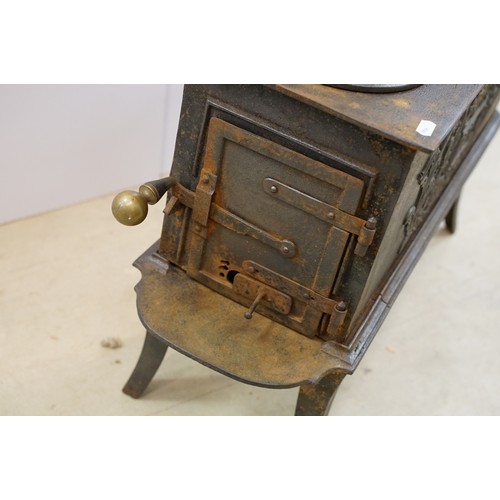 438 - Unusual 19th century Continental cast iron sectional stove of graduated three tiered form, the botto... 