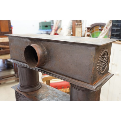 438 - Unusual 19th century Continental cast iron sectional stove of graduated three tiered form, the botto... 