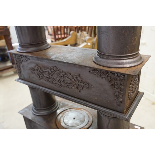 438 - Unusual 19th century Continental cast iron sectional stove of graduated three tiered form, the botto... 