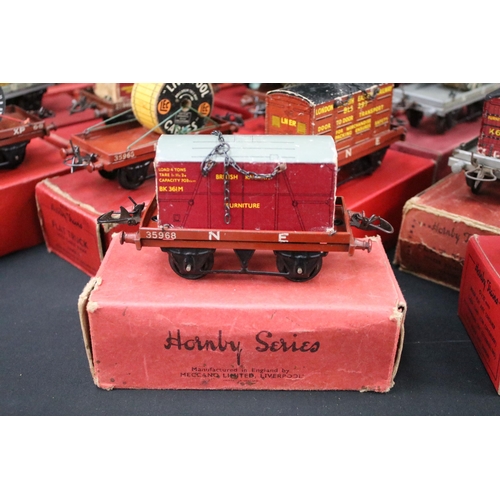 174 - 24 Boxed Hornby O gauge items of rolling stock to include 21 x Flat Truck and 3 x Low Sided Wagon, f... 