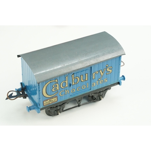 191 - 12 Hornby O gauge items of rolling stock to include Glass Lined Milk Dairies Milk Tank, Cadburys Cho... 