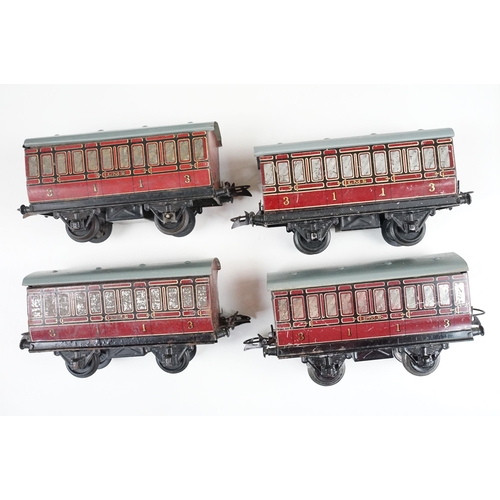 206 - Over 43 O gauge items of rolling stock to include many Hornby examples, featuring wagons, vans, tank... 
