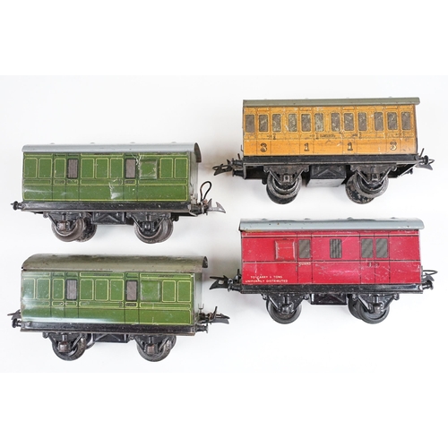 206 - Over 43 O gauge items of rolling stock to include many Hornby examples, featuring wagons, vans, tank... 