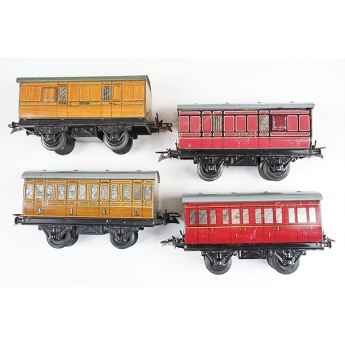 206 - Over 43 O gauge items of rolling stock to include many Hornby examples, featuring wagons, vans, tank... 