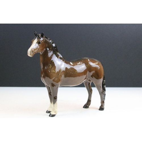 18 - Collection of four Beswick horses to include large shire 'Burnham Beauty' example H 27cm and a small... 