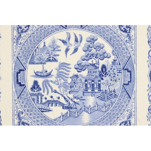 27 - Set of four framed blue and white willow pattern style tiles, tile size, W 20.5cm x D 20.5cm